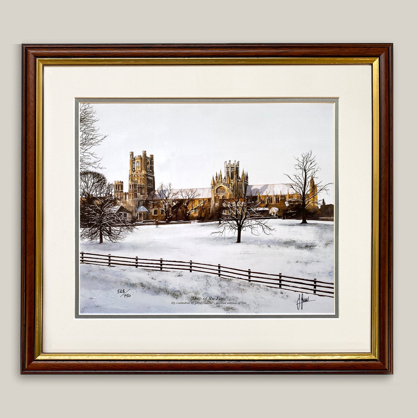 painting of Ely Cathedral in the snow framed in a dark wood frame