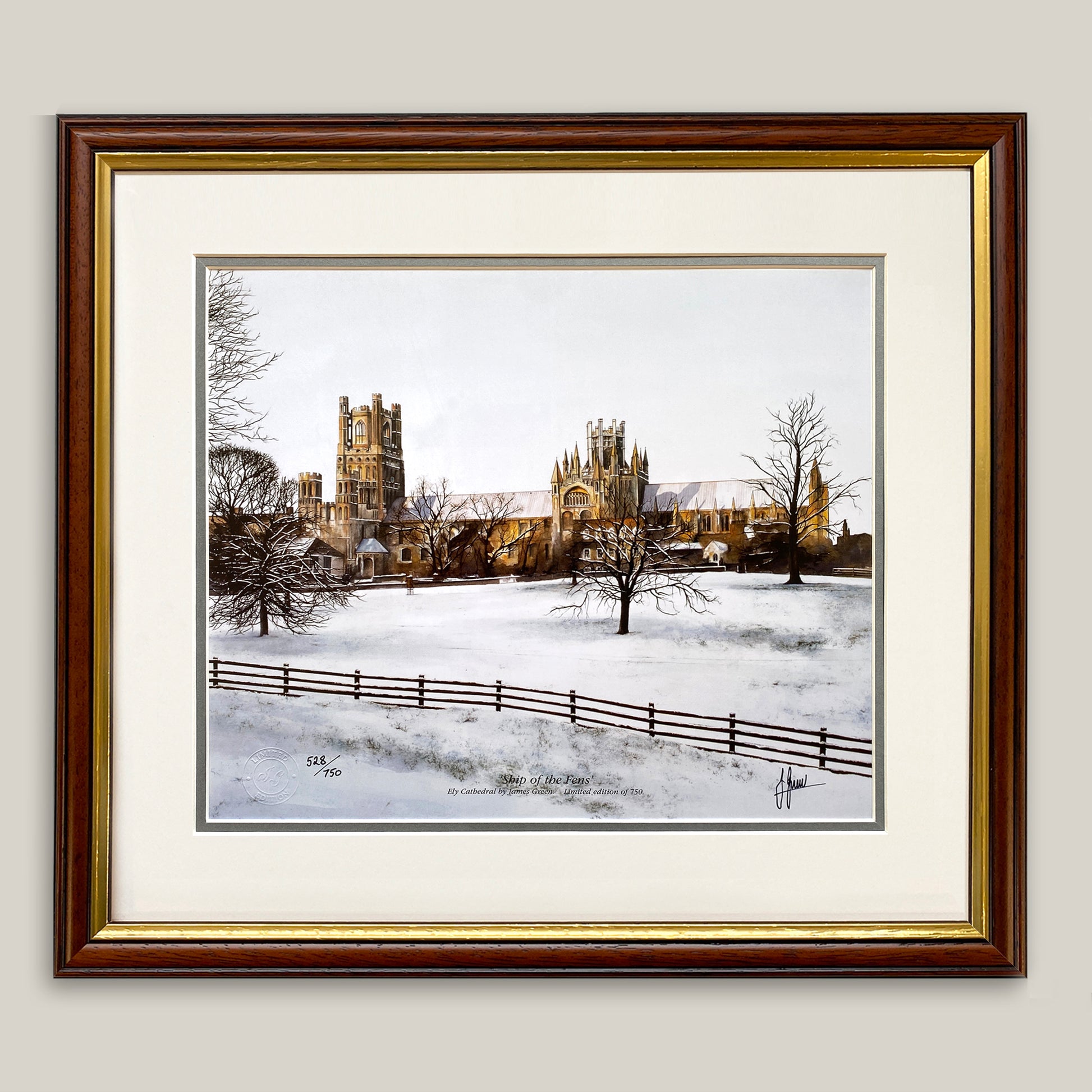painting of Ely Cathedral in the snow framed in a dark wood frame
