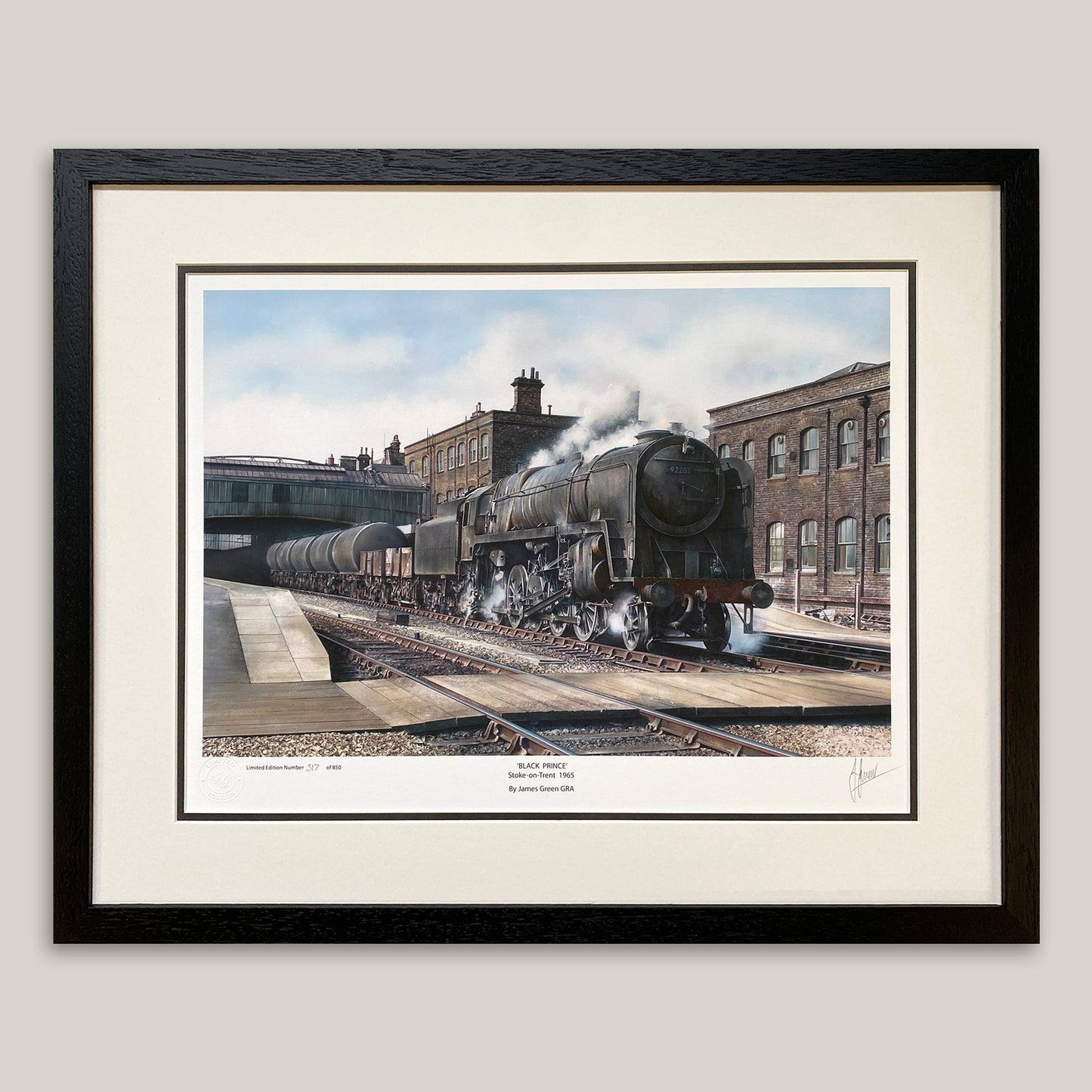 railway print of a 9f train  framed with a double mount in a black frame