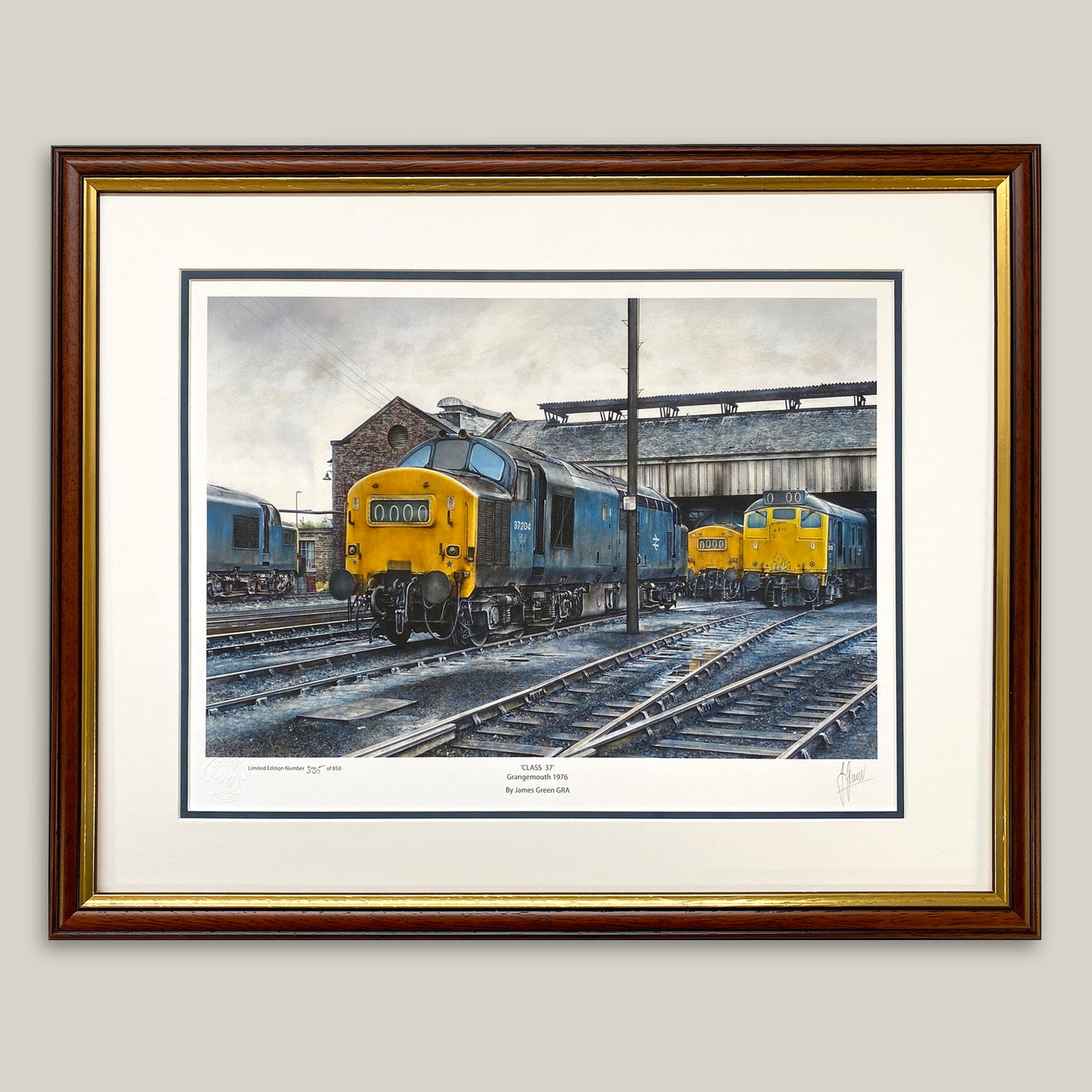A fine art print of class 37 trains at Grangemouth framed in a dark wood frame