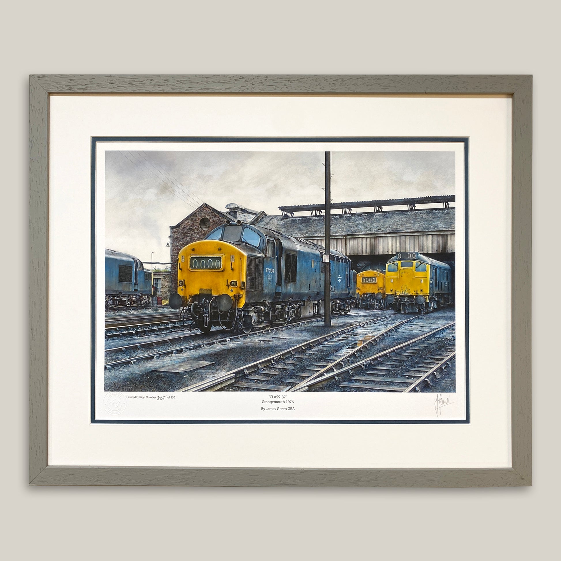print of class 37 engines by railway artist James Green in a grey frame